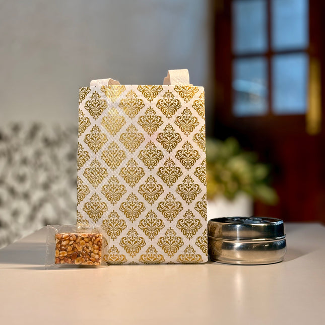 Smiley Stainless Steel Box + Peanut Chikki + Pvc Bag