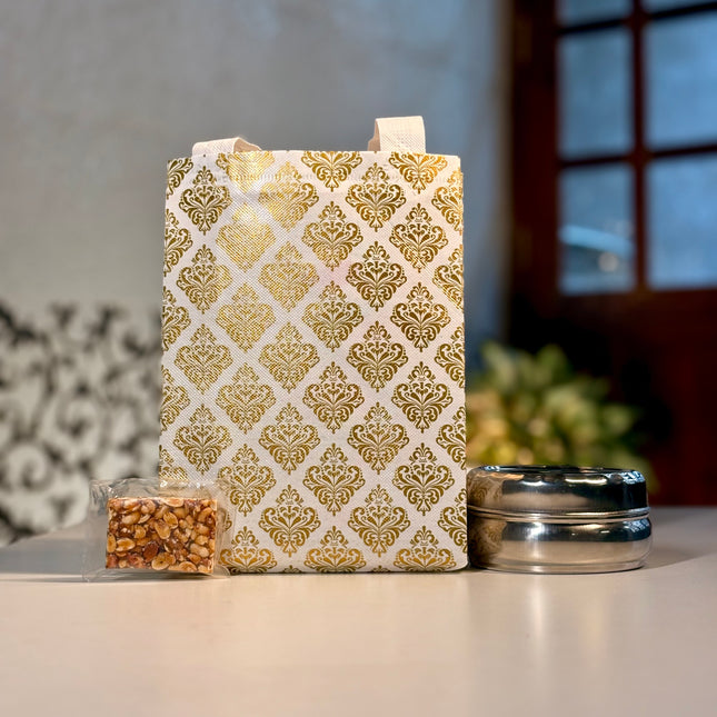 Stainless Steel Box + Peanut Chikki + Pvc Bag