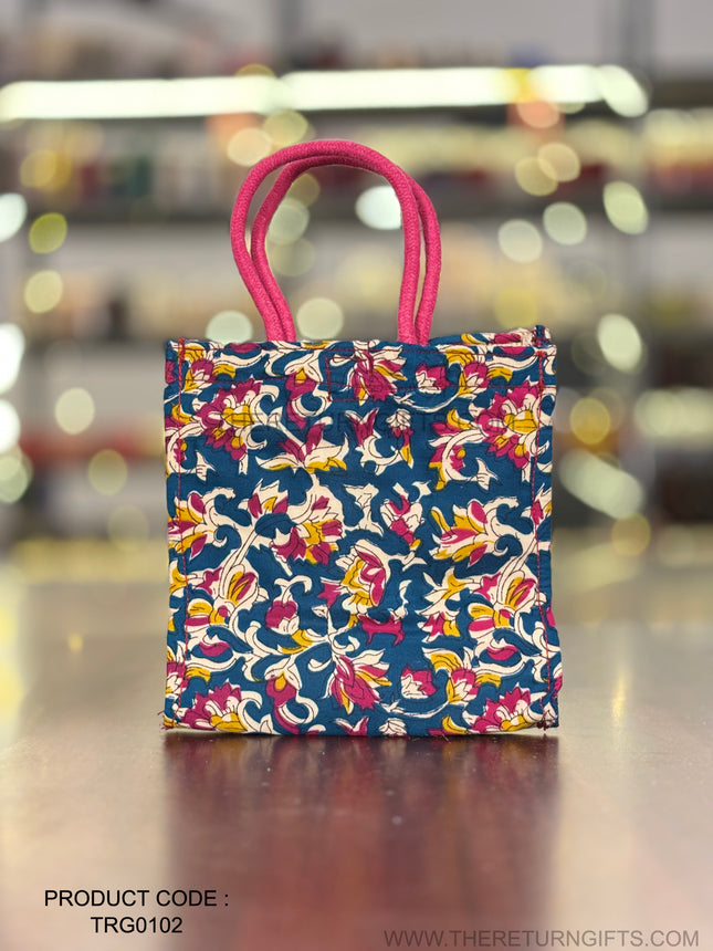 Blue Floral Fabric Jute Bag Return Gift | TRG0102 | Elegant Blue Jute Tote with Floral Fabric Panel Under ₹150 | Wedding, Kitty Party & Everyday Use Favor Bag