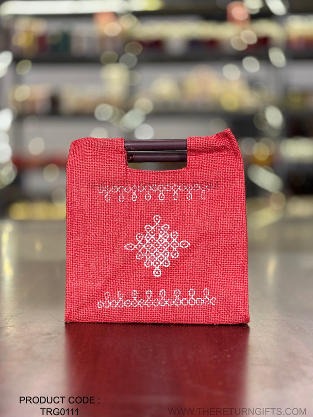 Red Kolam Jute Bag with Wooden Handle Return Gift | TRG0111 | Handcrafted Kolam Print Jute Tote Under ₹100 | Traditional Wedding, Seemantham & Pooja Favor Bag