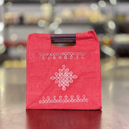 Red Kolam Jute Bag with Wooden Handle Return Gift | TRG0111 | Handcrafted Kolam Print Jute Tote Under ₹100 | Traditional Wedding, Seemantham & Pooja Favor Bag