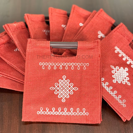Red Kolam Jute Bag with Wooden Handle Return Gift | TRG0111 | Handcrafted Kolam Print Jute Tote Under ₹100 | Traditional Wedding, Seemantham & Pooja Favor Bag